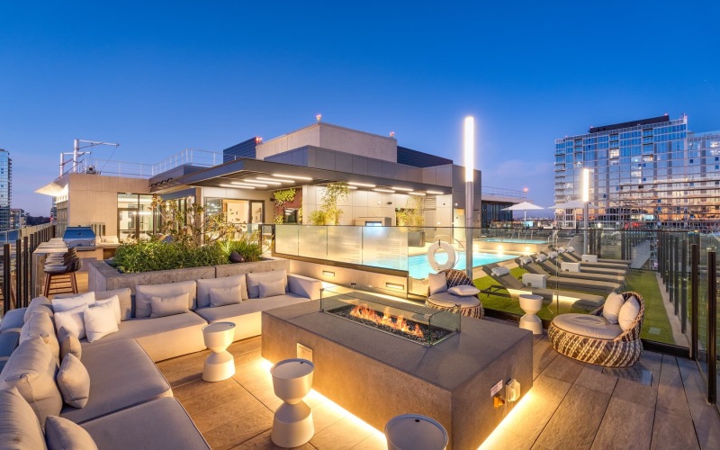 pool with nearby lighted seating